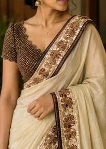 Elegant Cream Saree with Embroidered Border