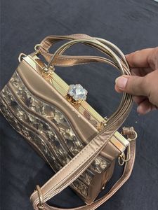 Elegant Rose Gold Clutch Bag