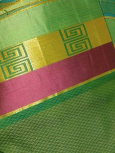 Elegant Green Saree with Gold Leaf Motifs