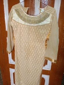 Elegant Beige Kurta with Embellished Neckline
