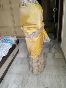 "Exquisite Net Silk Saree with Peacock Lace Design