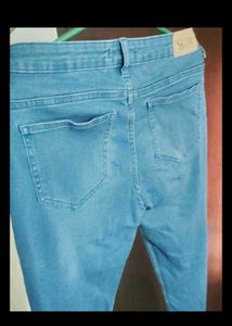 combo of jeans and 3-Pack Ribbed Mock Neck Sleevel