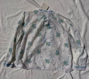White Floral Blouse with Blue Ribbon