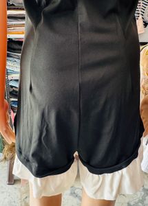Chic Black Halter Neck Romper with Ruffle Trim
