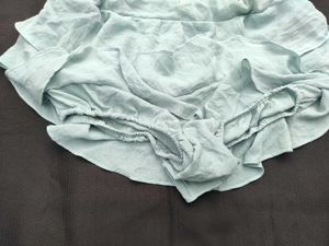 Light Blue Ruffled Mini Skirt with shorts attached