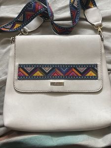 Stylish Crossbody Bag with Colorful Strap