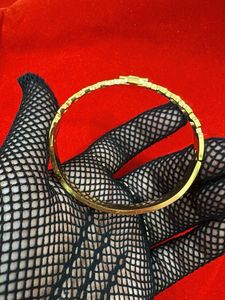 Elegant Gold CC Logo Bracelet