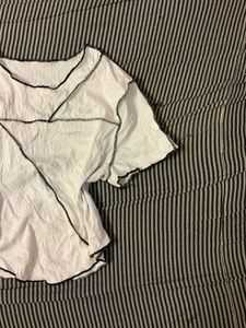 White Top with Black Stitch Detail