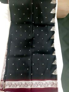 Elegant Black Saree with Intricate Borders