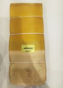 Vibrant Coral orange Saree with Intricate Weave