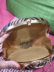 Round Leaf Print Clutch with Rhinestone Handle