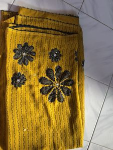 Yellow Saree with Floral Embellishments