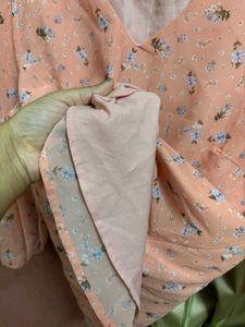 Chic Peach Floral Peplum Top