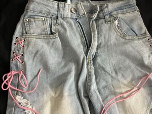 Distressed Denim Jeans with Pink Laces
