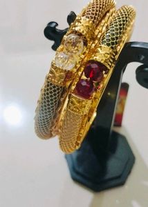 Brand new Elegant Gold Bangles with Red Stones
