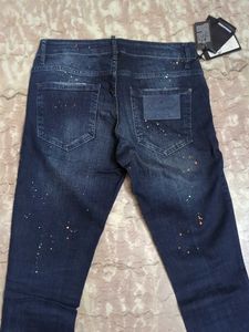 Stylish Dark Wash Jeans with Unique Embellishments