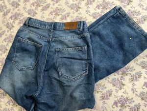 Ripped Knee Denim Jeans