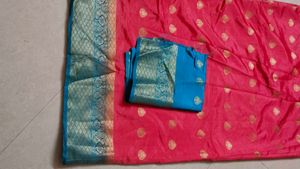 Vibrant Pink Silk Saree with Blue Border
