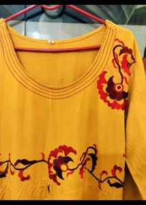Elegant Yellow Kurta with Red Accents