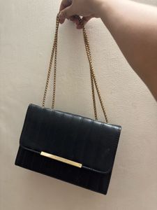 black sling bag