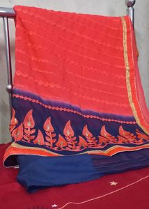 Elegant Red Saree with Embroidered Border