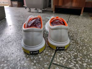 White &amp; Orange Accent Sneakers