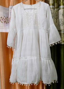 Elegant White Tiered Kurta with Pom-Pom Trim