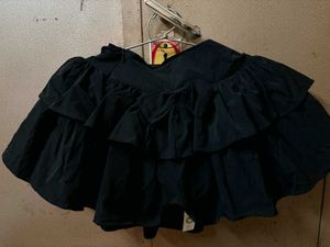 mini skirt black colour with chain , bow and inner