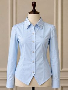 Elegant Blue Blouse with Embellished Collar
