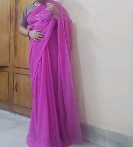 Vibrant Pink Saree with Subtle Embellishments