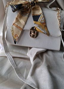 Chic White Shoulder Bag with Scarf Detail