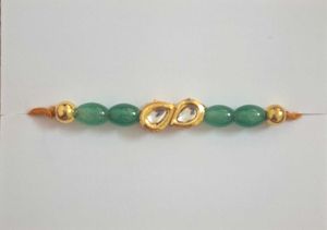 Elegant Green Beaded Kundan Rakhi.