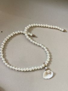 Elegant Faux Pearl Necklace with Shell Charm