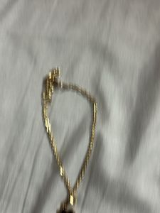 Gold bracelet  with Clover charm