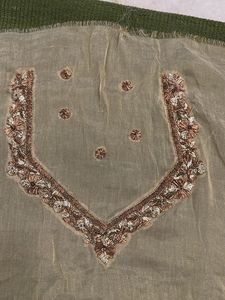 designer blouse piece in soft gold with hand work