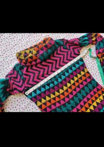 Vibrant Geometric Print Turtleneck Sweater