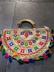 Embroidered Clutch with Tassels