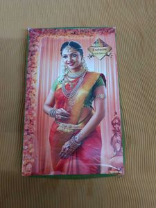 Green Embossed Soft Silk Saree