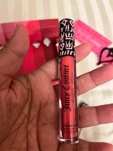 Juicy Couture plumping Lip Gloss