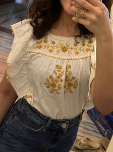 Embroidered Flutter Sleeve Top