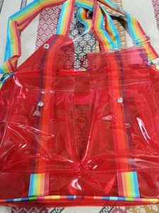 Red Jelly Duffle Bag with Rainbow Strap