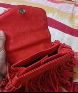 Chic Red Handbag with Gold Accent Handle