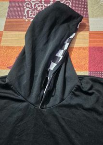 Black Hoodie with Checkered Detail