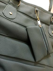 Chic Teal Handbag with Matching Pouch