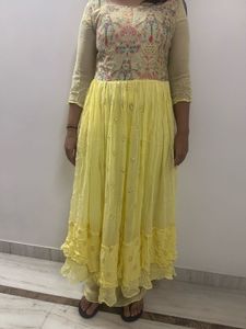 Elegant Yellow Kurta Set with Intricate Work