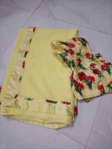 Beautiful Yellow Saree with Floral Blouse
