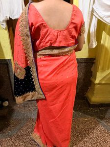 Elegant Peach Saree with Blue Border