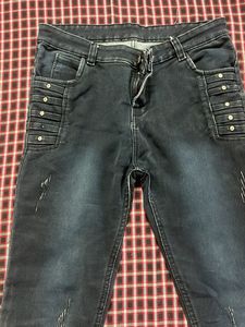 Dark Wash Ripped Jeans with Embellished Pockets