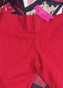 Elegant Red Trousers with Decorative Button