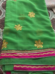 Vibrant Green Saree with Gold Embroidery